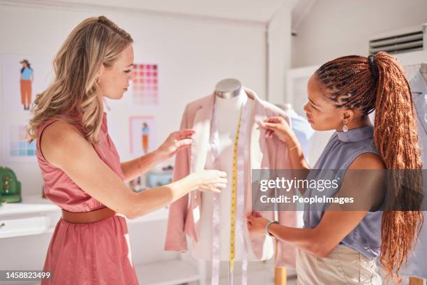 Women, seamstress and fashion designer clothing collaboration of clothes production project. Working woman employee group planning a fabric design and clothes making tailor workshop in a studio