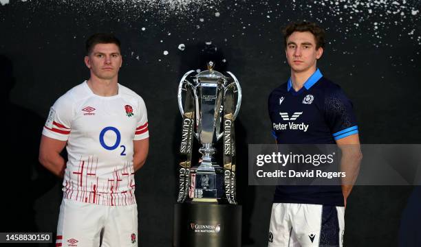 Owen Farrell, the Captain of England and Jamie Ritchie captain Scotland pose alongside the Guinness Six Nations trophy during the 2023 Guinness Six...