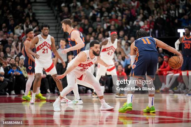 Fred VanVleet of the Toronto Raptors guards Jalen Brunson of the New York Knicks during the second half of their basketball game at the Scotiabank...