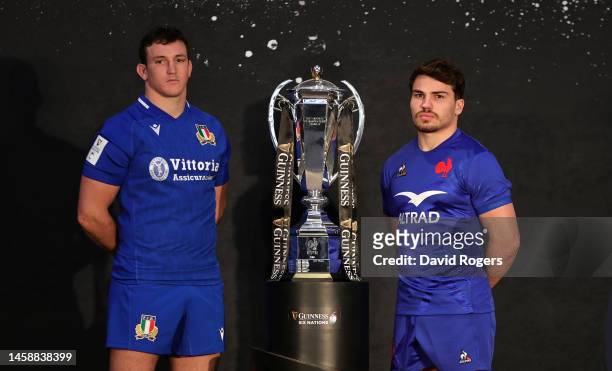 Michele Lamaro, Captain of Italy with Antoine Dupont, the France captain poses with the Guinness Six Nations trophy during the 2023 Guinness Six...