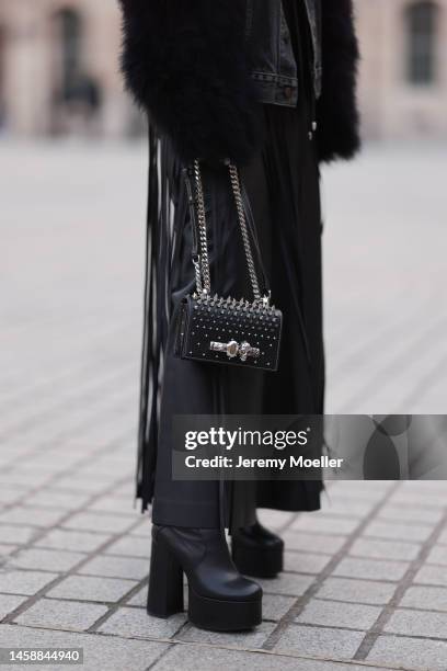 Corina Mihaila Larpin seen wearing black Jacket beau souci, black skirt Chloe, black Boots Yves Saint Laurent, Jewels stefere, black bag Alexander...