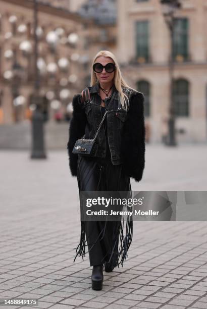 Corina Mihaila Larpin seen wearing black Jacket beau souci, black skirt Chloe, black Boots Yves Saint Laurent, Jewels stefere, black bag Alexander...