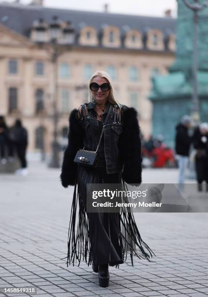 Corina Mihaila Larpin seen wearing black Jacket beau souci, black skirt Chloe, black Boots Yves Saint Laurent, Jewels stefere, black bag Alexander...