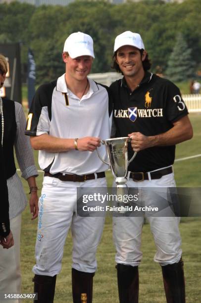 Prince Harry of Wales and Nacho Figueras attend Veuve Cliquot's third annual Polo Classic on Governor's Island.