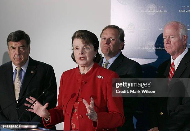 Sen. Dianne Feinstein , , speaks to the media while flanked by U.S. Sen. Saxby Chambliss , U.S. Rep. Mike Rogers and U.S. Rep. Dutch Ruppersberger ,...