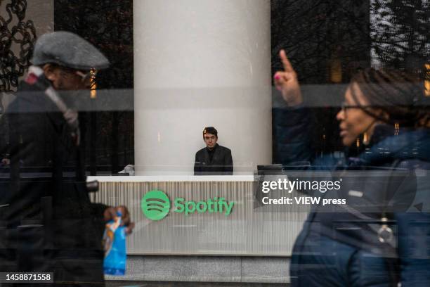 People are seen inside the Spotify headquarters building in Lower Manhattan on January 23, 2023 in New York City. Spotify announced Monday they will...