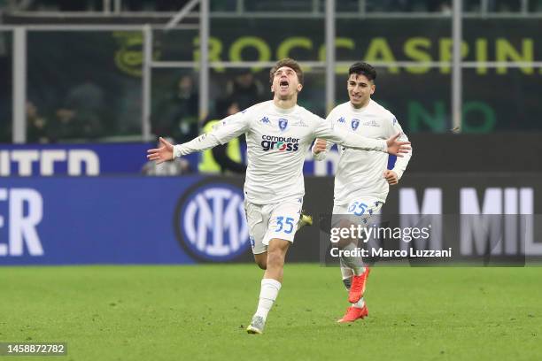 Tommaso Baldanzi celebrates with Fabiano Parisi of Empoli FC after scoring the team's first goal during the Serie A match between FC Internazionale...