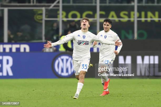 Tommaso Baldanzi celebrates with Fabiano Parisi of Empoli FC after scoring the team's first goal during the Serie A match between FC Internazionale...