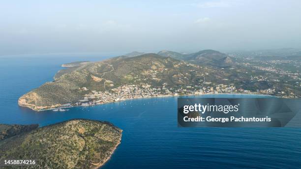 aerial photo of tolo village and the calm sea in the peloponnese, greece - otlo stock pictures, royalty-free photos & images