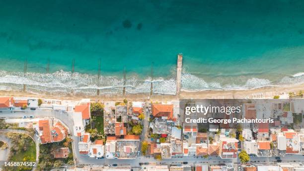 top down aerial photo of houses next to the sea - otlo stock pictures, royalty-free photos & images