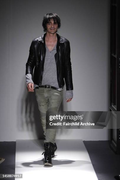 Designer Christophe Decarnin on the runway after Balmain's spring 2010 show at Intercontinental Paris Le Grand Hotel.