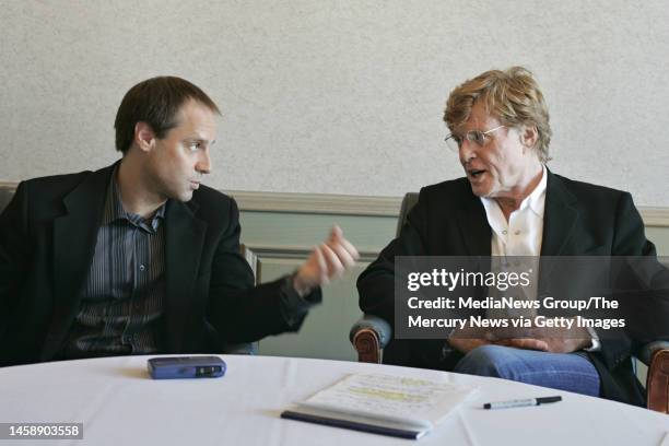 Former eBay President Jeff Skoll and Robert Redford discuss The New Heroes on June 20, 2005 in San Jose, Calif. The Skoll Foundation is sponsoring...