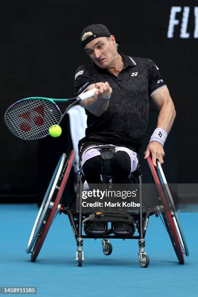 Gustavo Fernandez of Argentina plays a forehand in his Men's Wheelchair Singles match against Ruben Spaargaren of the Netherlands during day nine of...
