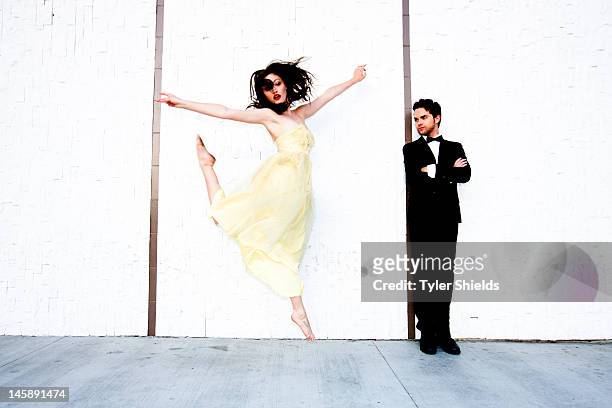 Actors Thomas Dekker and Phoebe Tonkin are photographed for Self Assignment on May 4, 2012 in Los Angeles, California.