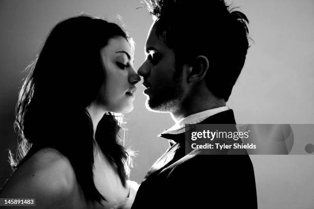 Actors Thomas Dekker and Phoebe Tonkin are photographed for Self Assignment on May 4, 2012 in Los Angeles, California.