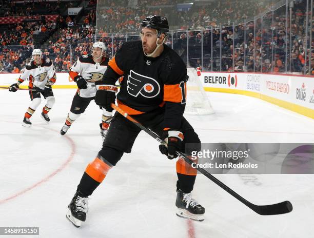 Kevin Hayes of the Philadelphia Flyers skates against Simon Benoit and John Klingberg of the Anaheim Ducks at the Wells Fargo Center on January 17,...