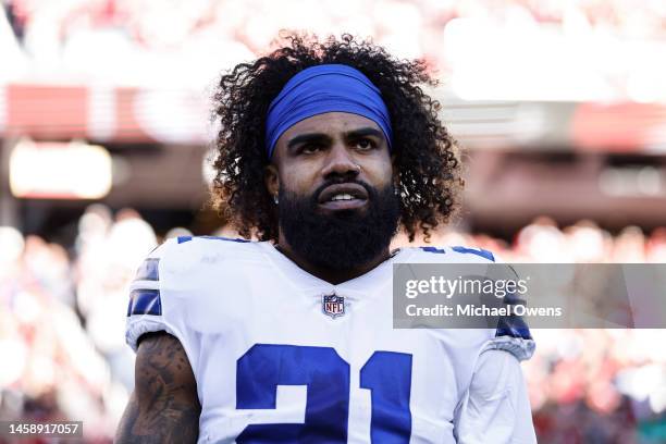 Ezekiel Elliott of the Dallas Cowboys looks on during the national anthem prior to an NFL divisional round playoff football game between the San...