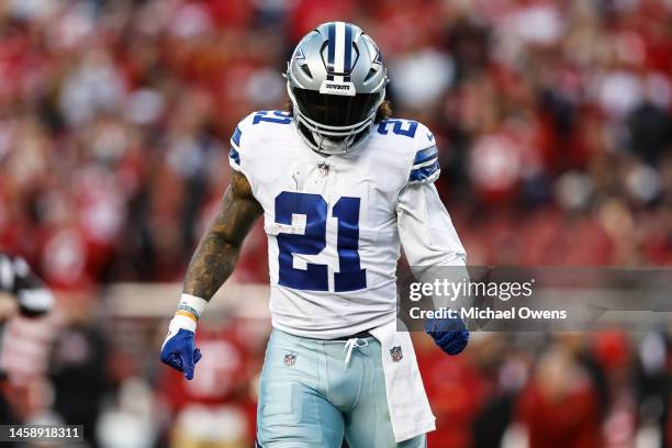 Ezekiel Elliott of the Dallas Cowboys looks on during an NFL divisional round playoff football game between the San Francisco 49ers and the Dallas...