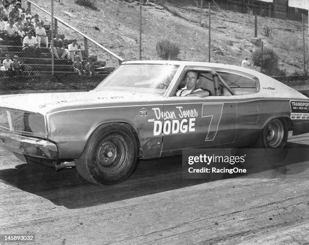 Two-time NASCAR Pacific Coast/Winston West Series champion Jim McCoy of Modesto, CA, prepares for a dirt track NASCAR race in his Dodge Charger.