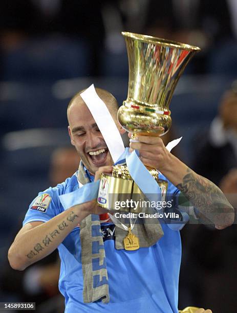 Paolo Cannavaro of SSC Napoli holds the Italian Tim Cup football trophy, during a ceremony after the Tim Cup Final between Juventus FC and SSC Napoli...