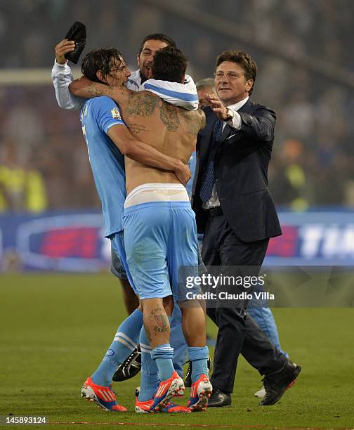 Edinson Cavani, Ezequiel Lavezzi and head coach Walter Mazzarri of SSC Napoli celebrate after the Tim Cup Final between Juventus FC and SSC Napoli at...