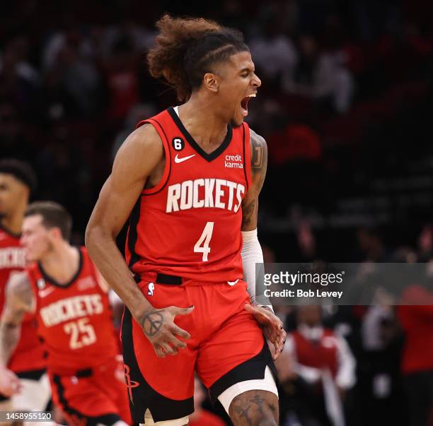 Jalen Green of the Houston Rockets reacts after making a three point basket against the Minnesota Timberwolves during the fourth quarter at Toyota...