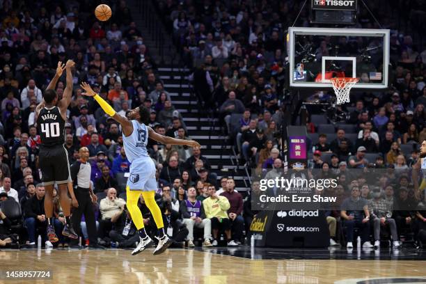 Harrison Barnes of the Sacramento Kings shoots a three-point basket over Jaren Jackson Jr. #13 of the Memphis Grizzlies in the first quarter at...