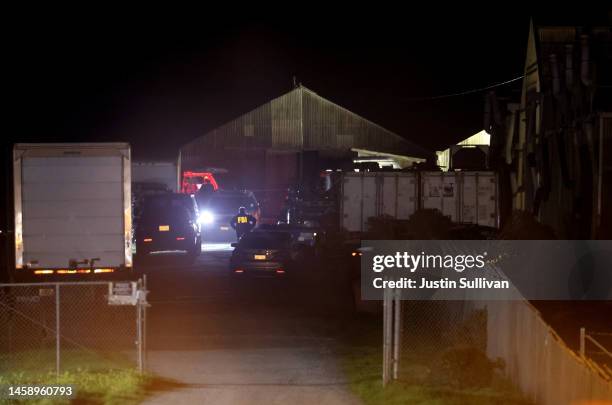 An FBI agent works at the scene of a shooting on January 23, 2023 in Half Moon Bay, California. Seven people were killed at two separate farm...