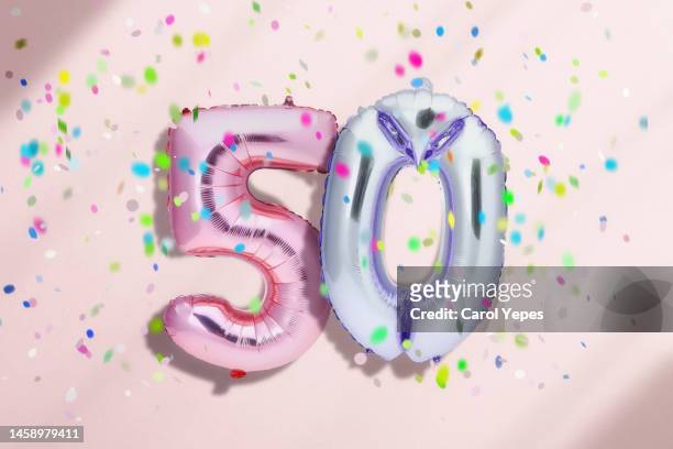 50 party balloon confetti - birthday icons stock-fotos und bilder