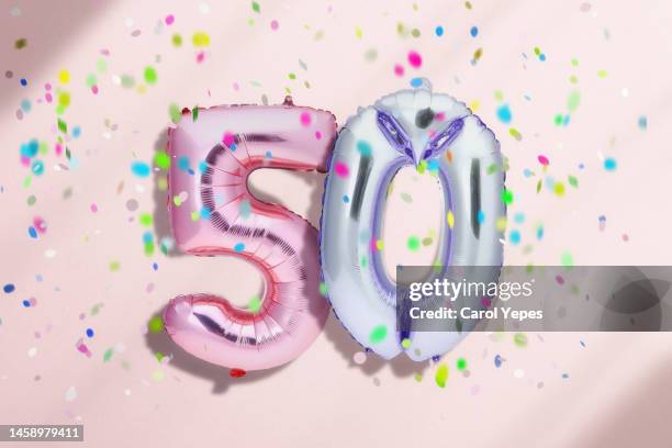 50 party balloon confetti - congratulations balloons stock pictures, royalty-free photos & images