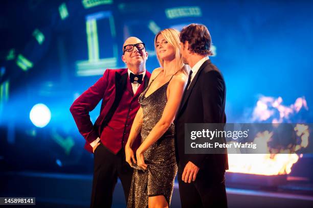 Thomas Rath, Heidi Klum and Thomas Hayo during the opening part of "Germany's Next Topmodel" Finals at the Lanxess-Arena on June 07, 2012 in Cologne,...