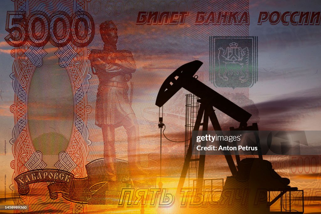 Oil pump on the background of Russian rubles bill. World Oil Industry