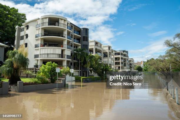 residential street under water during the 2022 brisbane floods - queensland floods stock pictures, royalty-free photos & images