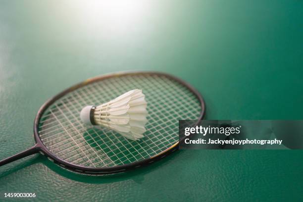 badminton balls and badminton rackets - badminton stock pictures, royalty-free photos & images