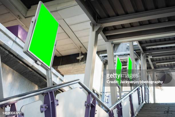 blank green billboard at subway station - airport mockup stock pictures, royalty-free photos & images