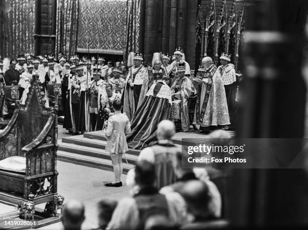 King George VI receives the homage of the peers after his coronation ceremony, held at Westminster Abbey in London, England, 12th May 1937. The...