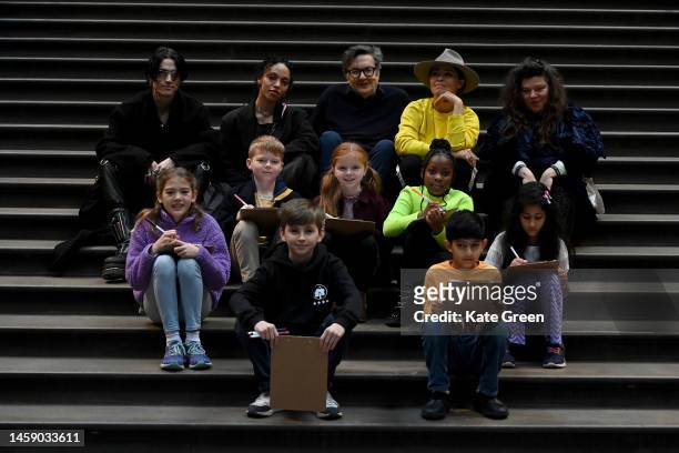 Jordan Hemingway, FKA Twigs, Mark Wallinger, Es Devlin and Tai Shani pose for a photo with schoolchildren at the launch of the "The Wild Escape"...