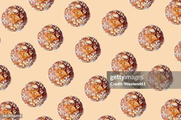 little king cake pattern over beige background - rosca de reyes stock illustrations