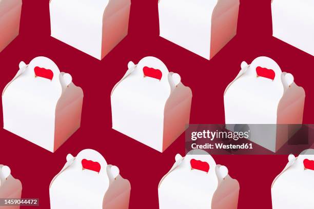 take away boxes arranged over red background - fast food stock illustrations
