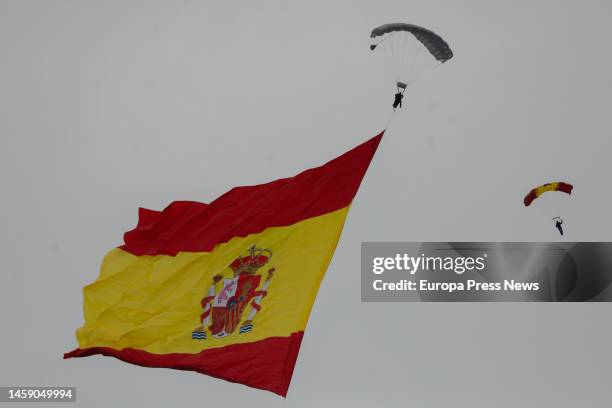 Parachutist with a Spanish flag on the 75th anniversary of the creation of the 'Mendez Parada' Military Parachuting School, at the Alcantarilla air...