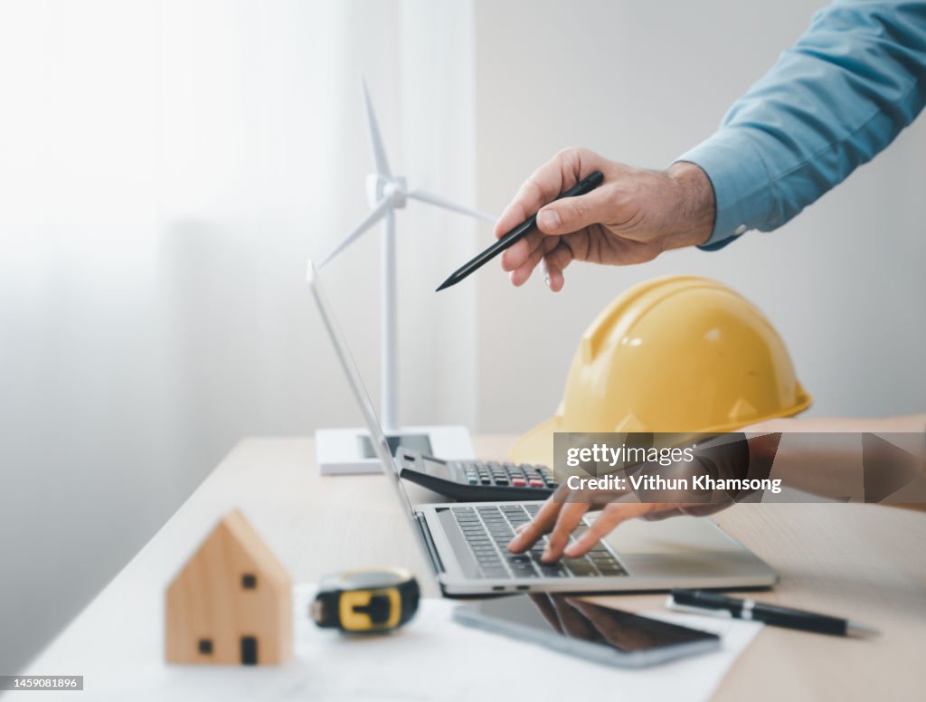 Engineer Using Computer Work Image Engineer Working With Computer And Tool At Office High-Res Stock Photo ...
