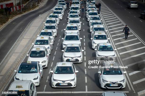 Cabs stopped during a peaceful march called by the Professional Taxi Federation of Madrid , on 24 January, 2023 in Madrid, Spain. More than 6,000...