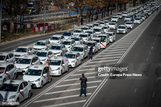 Cabs stopped during a peaceful march called by the Professional Taxi Federation of Madrid , on 24 January, 2023 in Madrid, Spain. More than 6,000...