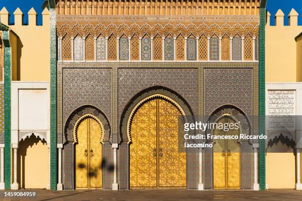 the royal palace golden doors, fez, morocco - imperial city stock pictures, royalty-free photos & images