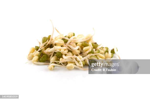 pea seeds with sprouts close up macro shot top view isolated on white background - grass pile white background stock-fotos und bilder