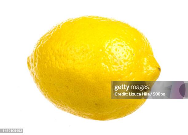 fresh ripe lemons isolated on white background,romania - lemon stockfoto's en -beelden