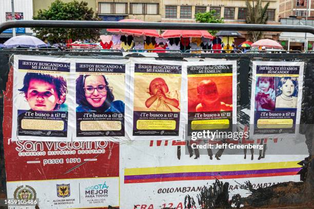 Bogota, Colombia, posters about family reunification campaign, illegal adoption victims and human trafficking of war orphans .