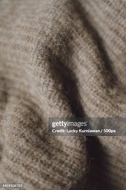 full frame shot of brown textile,indonesia - angora sweater stock-fotos und bilder