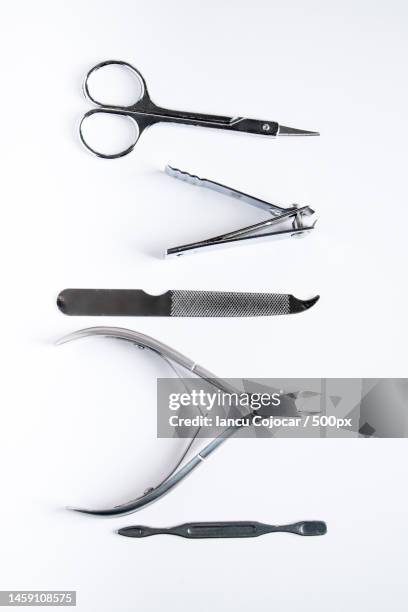 tools for manicure and nail care on white background,romania - nail file stock pictures, royalty-free photos & images