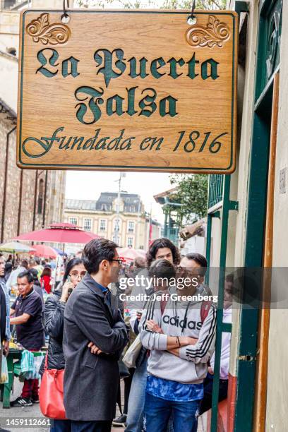 Bogota, Colombia, La Candelaria, Centro Historico, Restaurante La Puerta Falsa, landmark restaurant founded in 1816, long line of people waiting to...